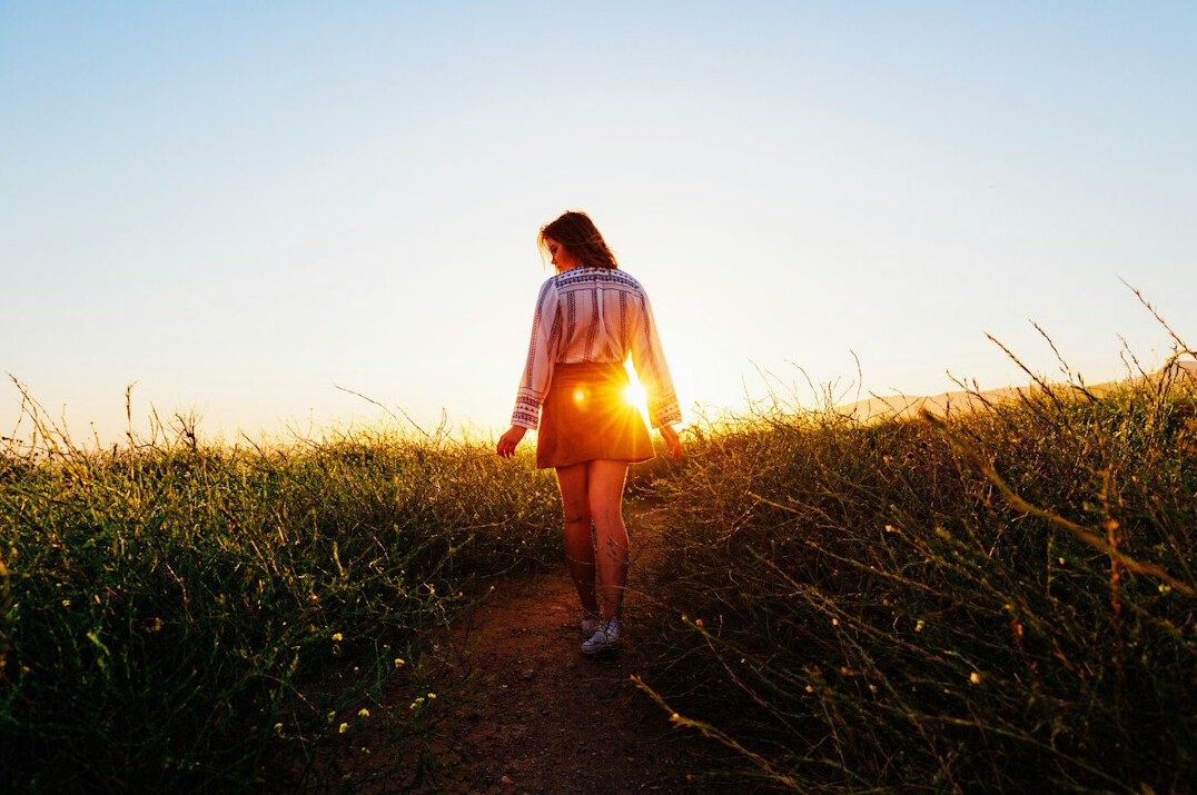 person walking in nature