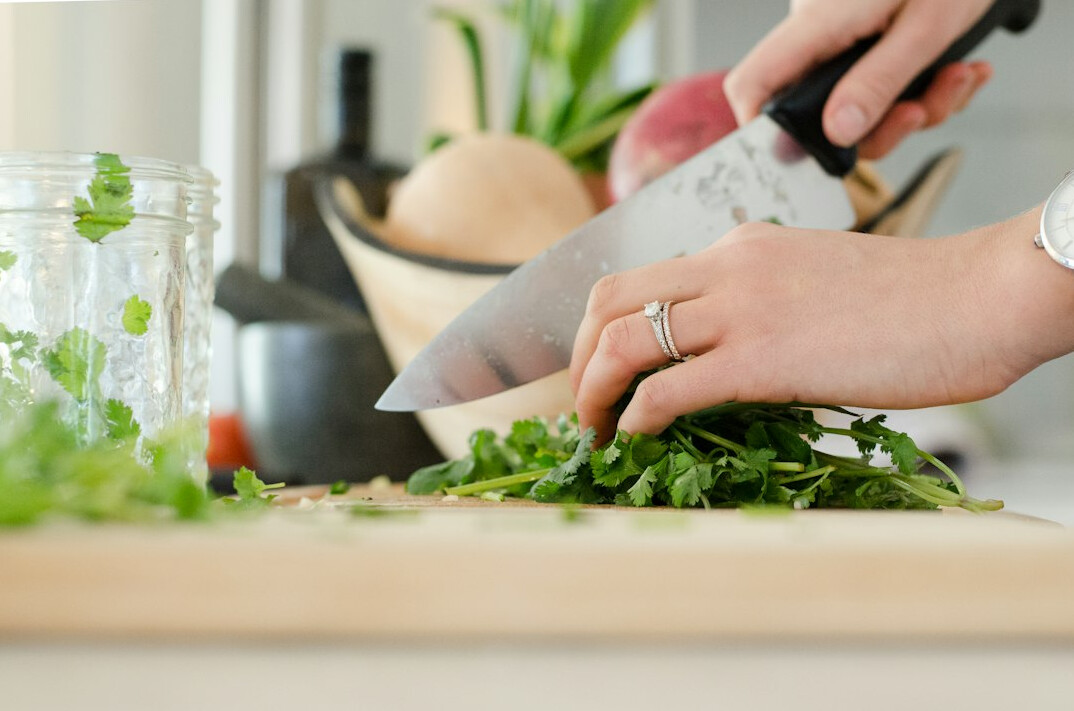 woman preparing healthy salad