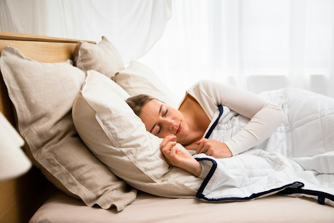 woman sleeping peacefully in bed
