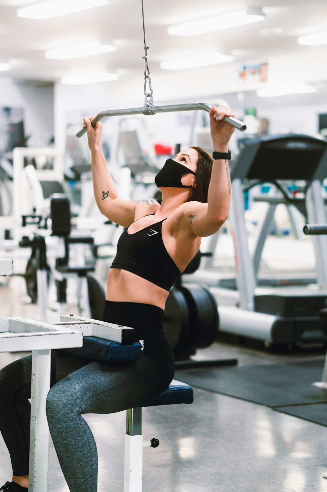 Woman training in a gym with a smile